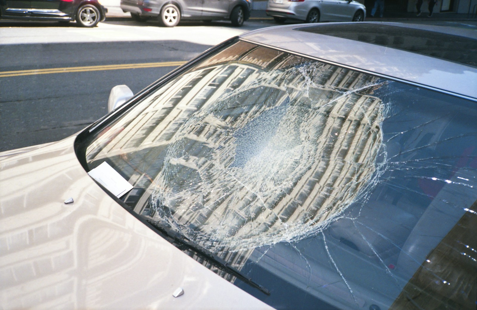 Vehicle with a busted windshield – Highlighting the importance of full glass coverage for vehicles in Alabama and Georgia.
